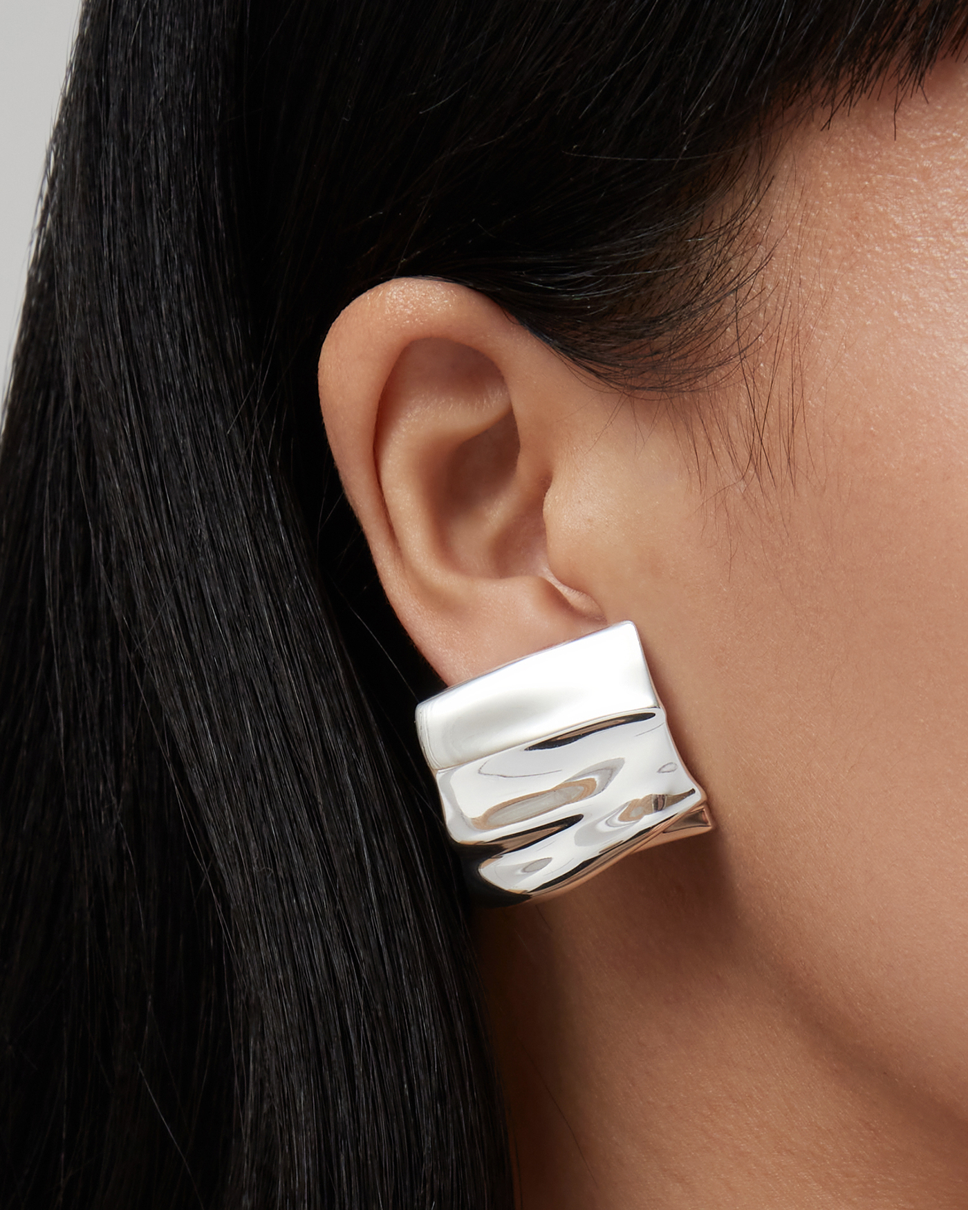 Sundra Clip On Earrings