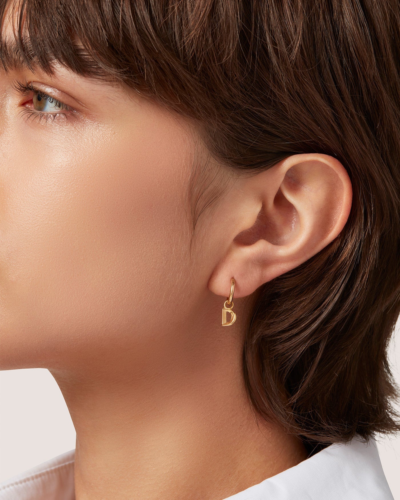 Single Monogram Huggie Earring - D